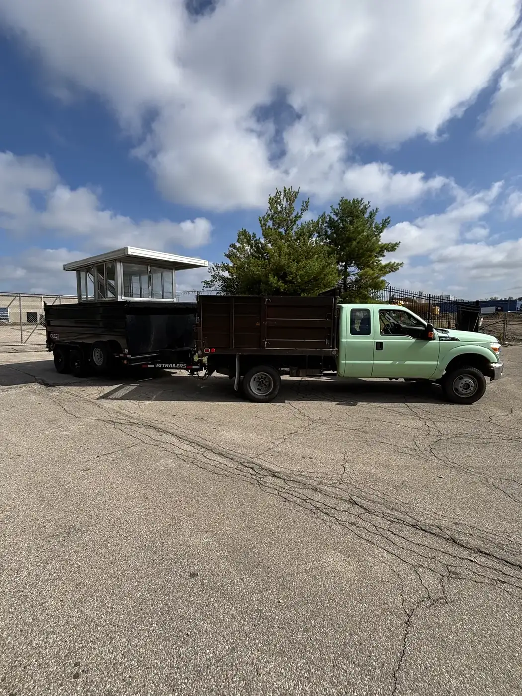Phelps truck bed loaded with junk removal material